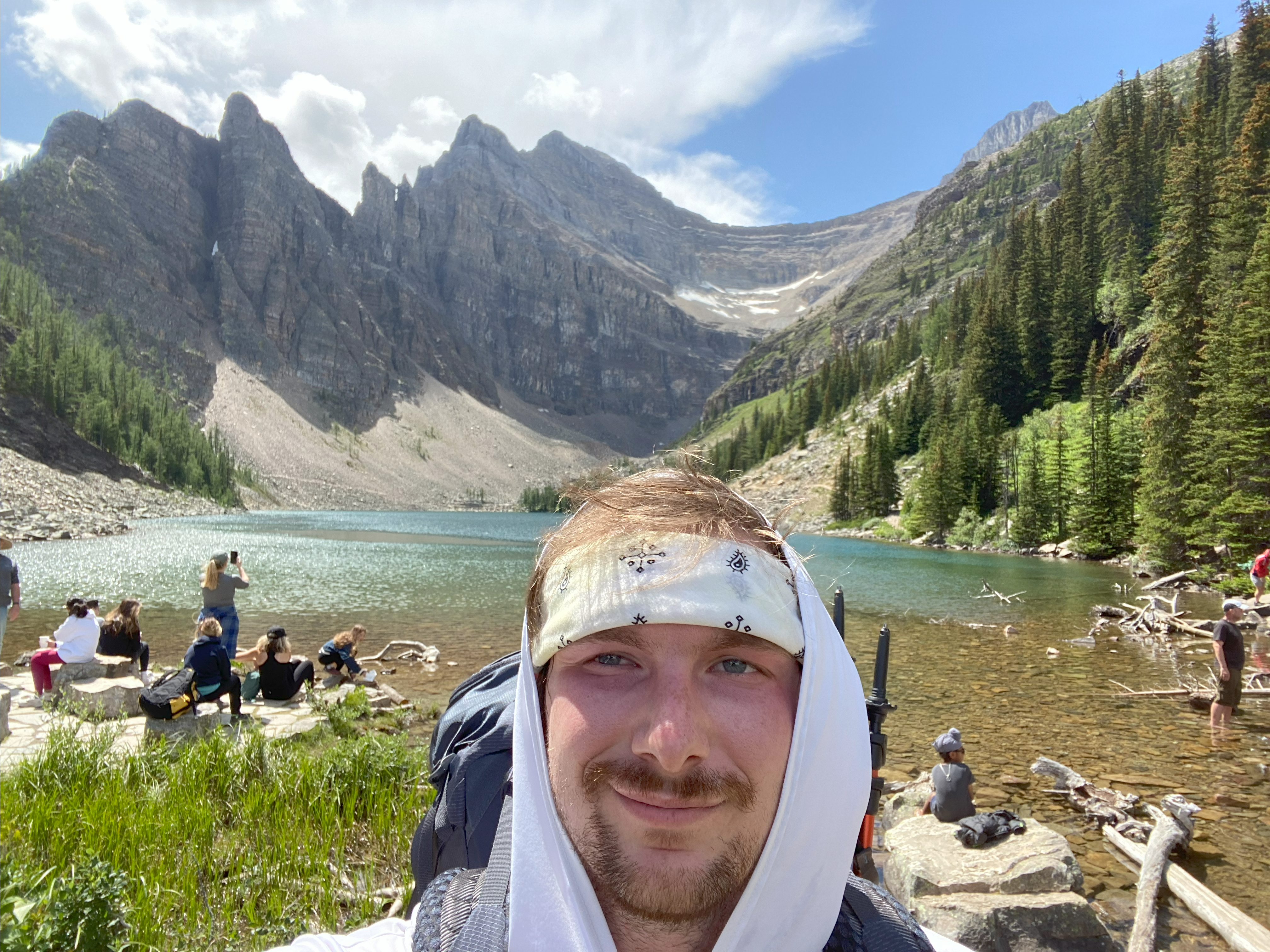 Nature Up North Project Manager Dan French takes a selfie in front of Lake Agnes in Banff National Park.