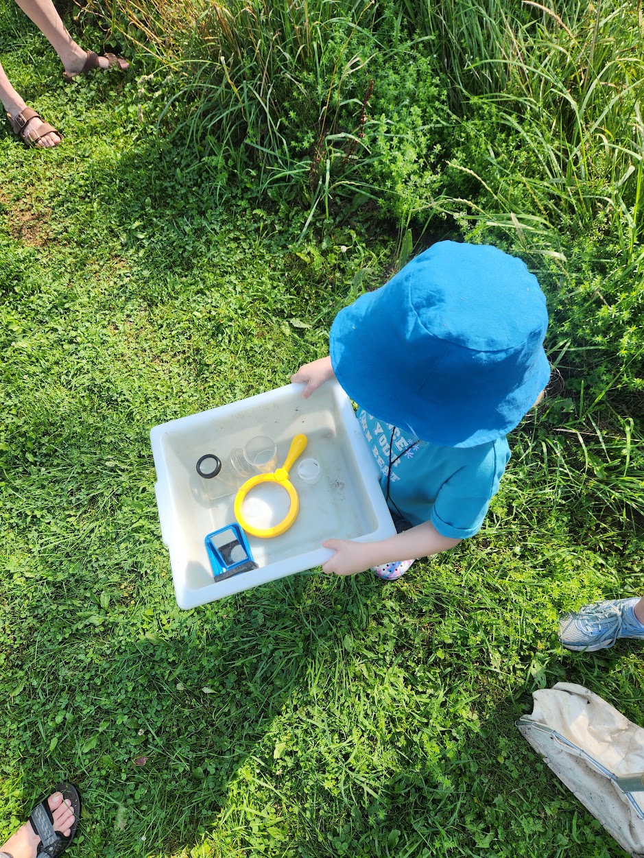 A child with kids tools for finding plastics