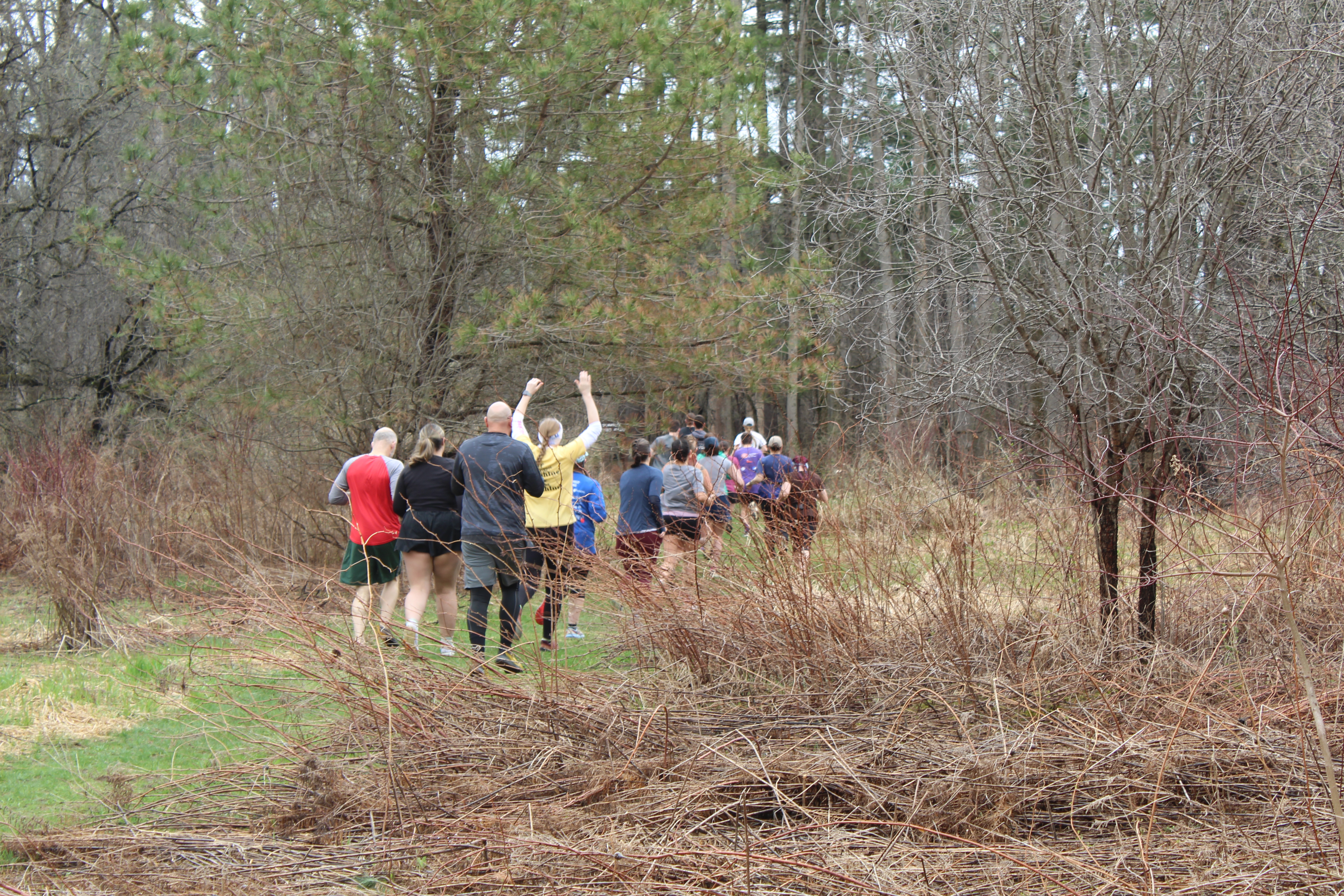 Runners leave the start of the 10th Annual Earth Day 7K