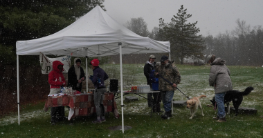 Participants register in the snow