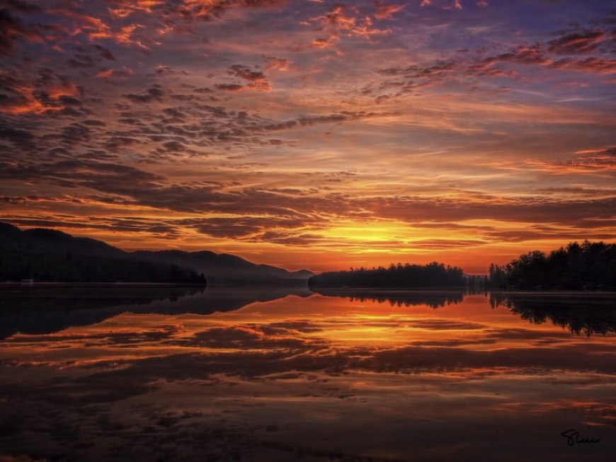 Sunrise on Alger Island, Fourth Lake captured by Sherrill Barlow