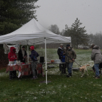 Participants register in the snow