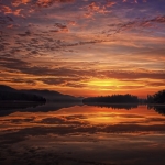 Sunrise on Alger Island, Fourth Lake captured by Sherrill Barlow