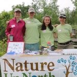 Nature Up North summer interns Jess, Maggie, and Alyssa with Project Manager Emlyn Crocker at Indian Creek Nature Center's Conservation Field Day.