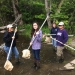 The interns learn water sampling using nets